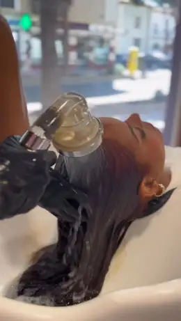 Getting my hair washed at the salon