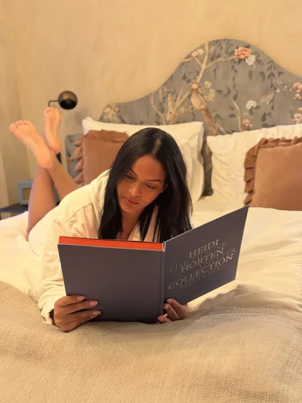 Reading in bed at Hotel Motto