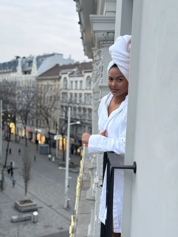 Bathrobe on the balcony overlooking the avenue